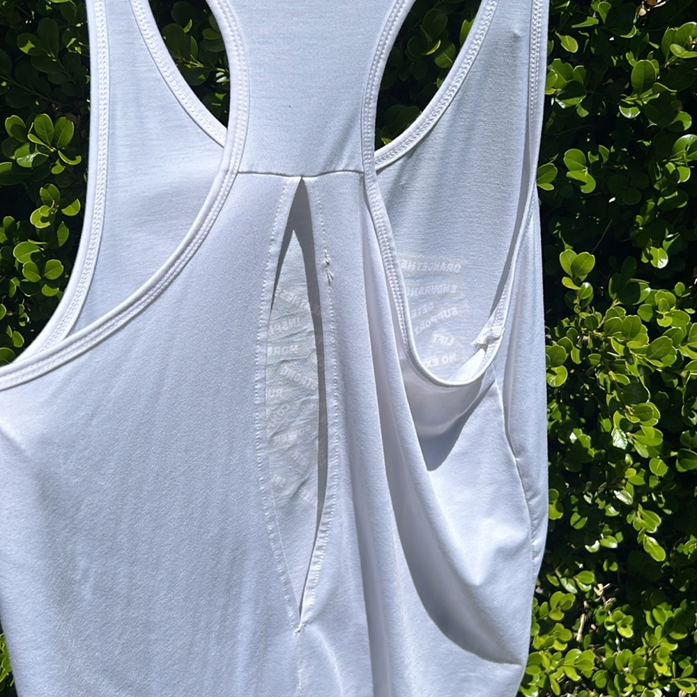 Orangetheory white tank with gold lettering and open slit in back - Picture 5 of 9